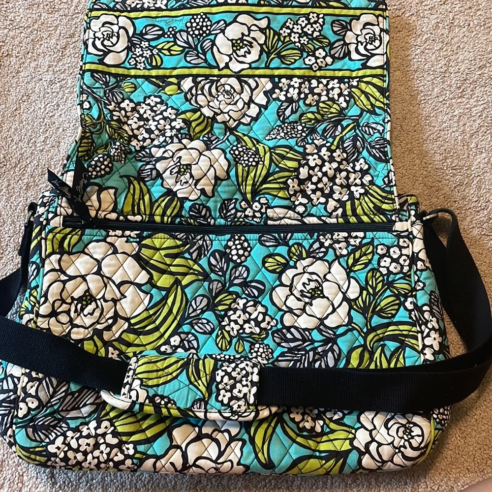 Vera Bradley, blue white, and green laptop case with over the shoulder strap.